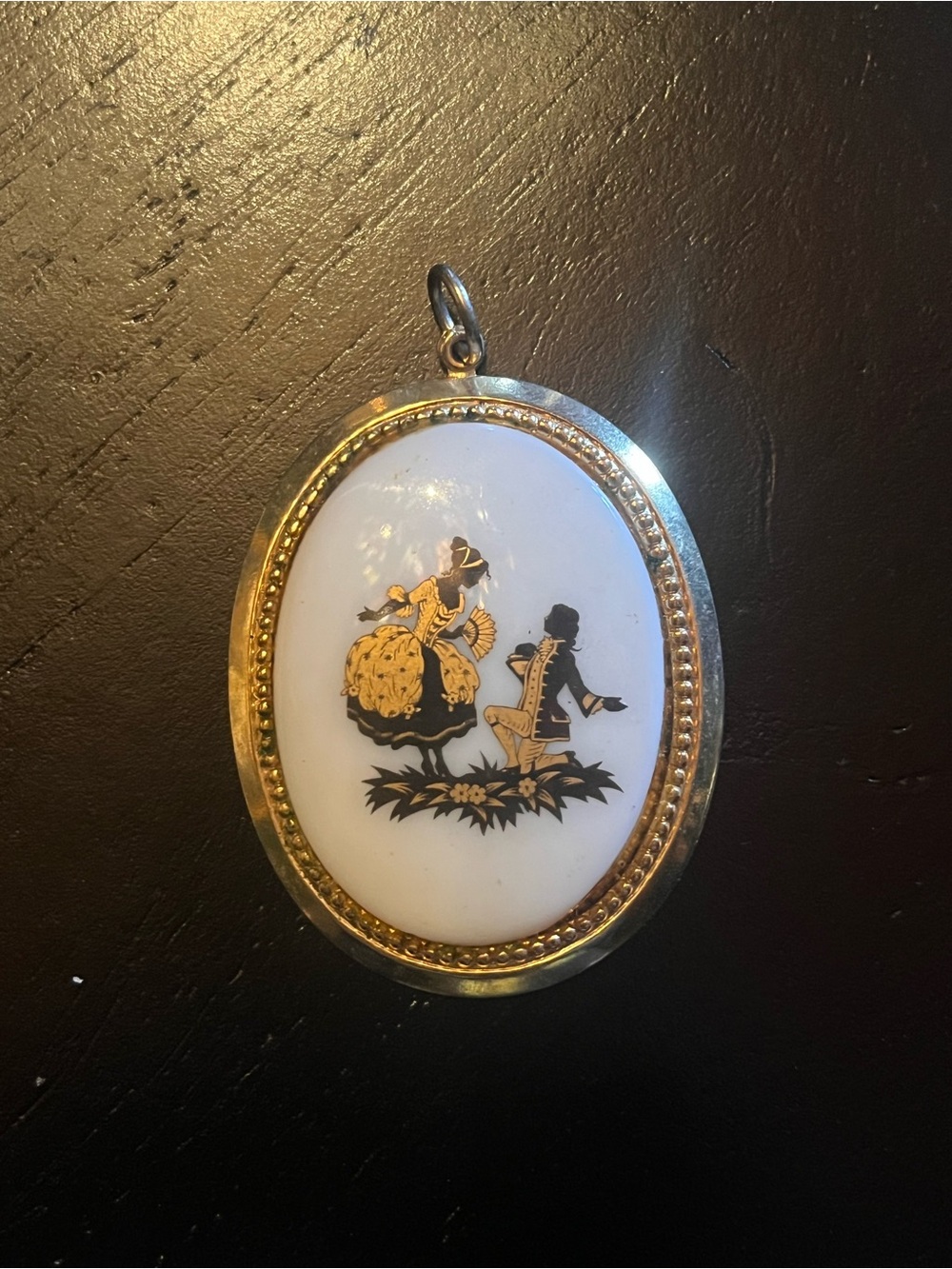 Vintage White Oval Porcelain Pendant with Gold and Black Romance Motif